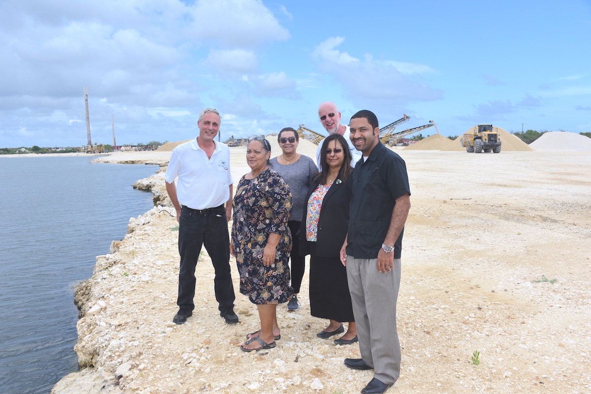 Hon. Juliana O'Connor-Connolly  and officials from the Ministry of Lands during a site visit 