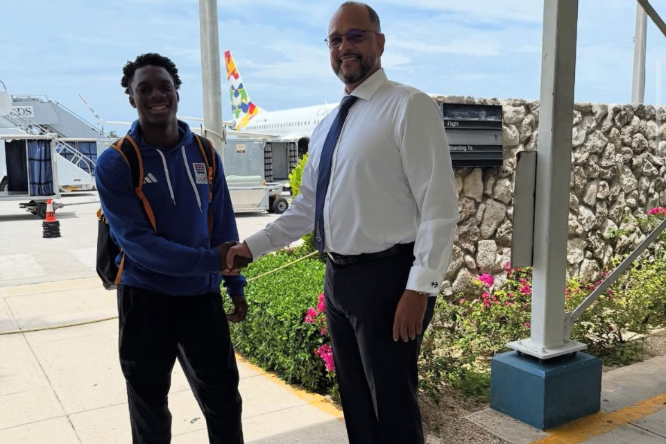 Honourable Minister Rankine Welcomes Home Caymanian Olympian and two-time CARIFTA Champion Davonte Howell.