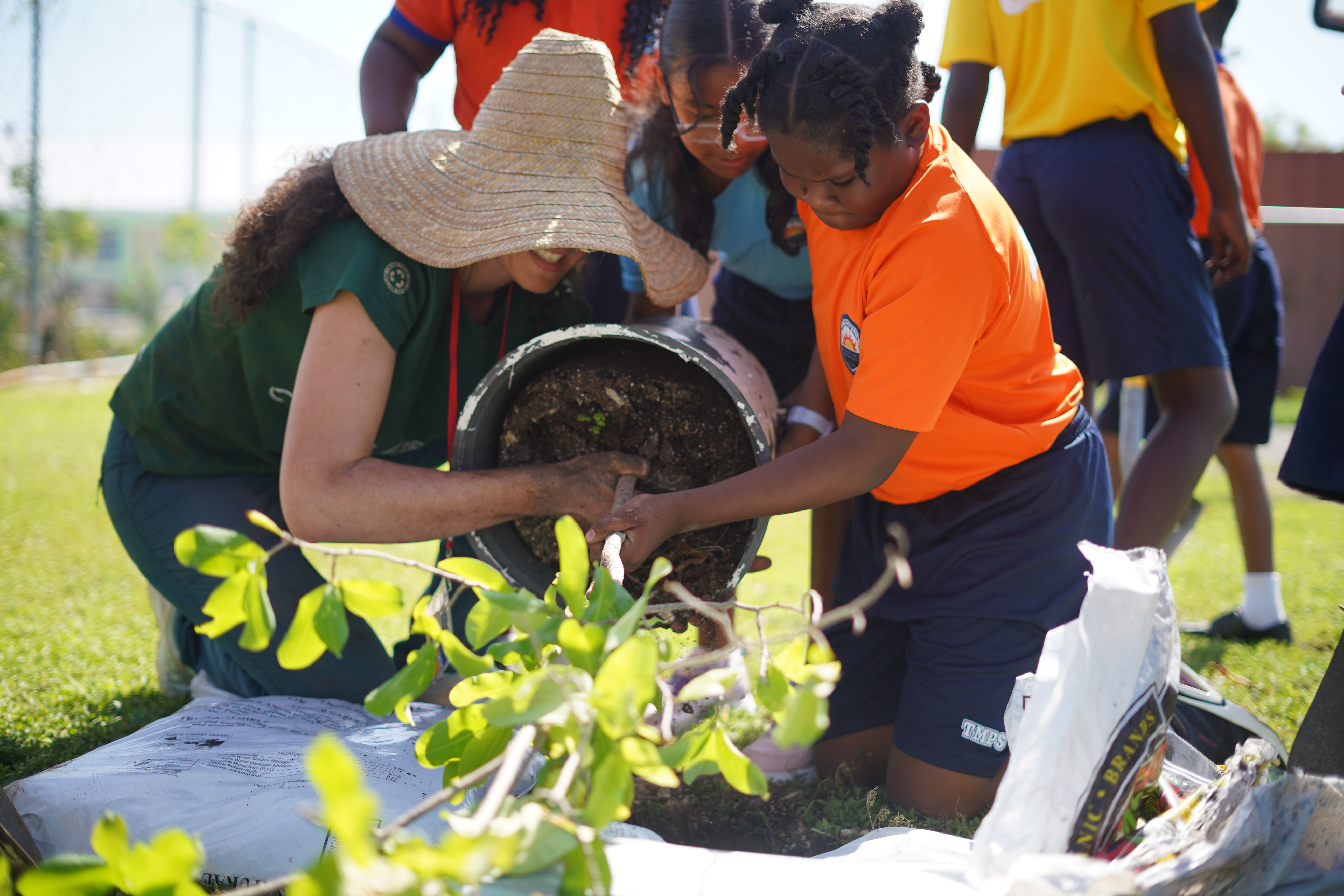 Students planting trees with Ministry of Sustainability and climate resiliency and wellness  